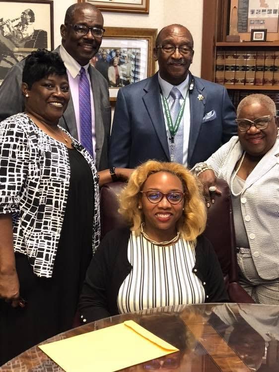 Candace N. Newell with family and colleagues at her candidacy qualifying