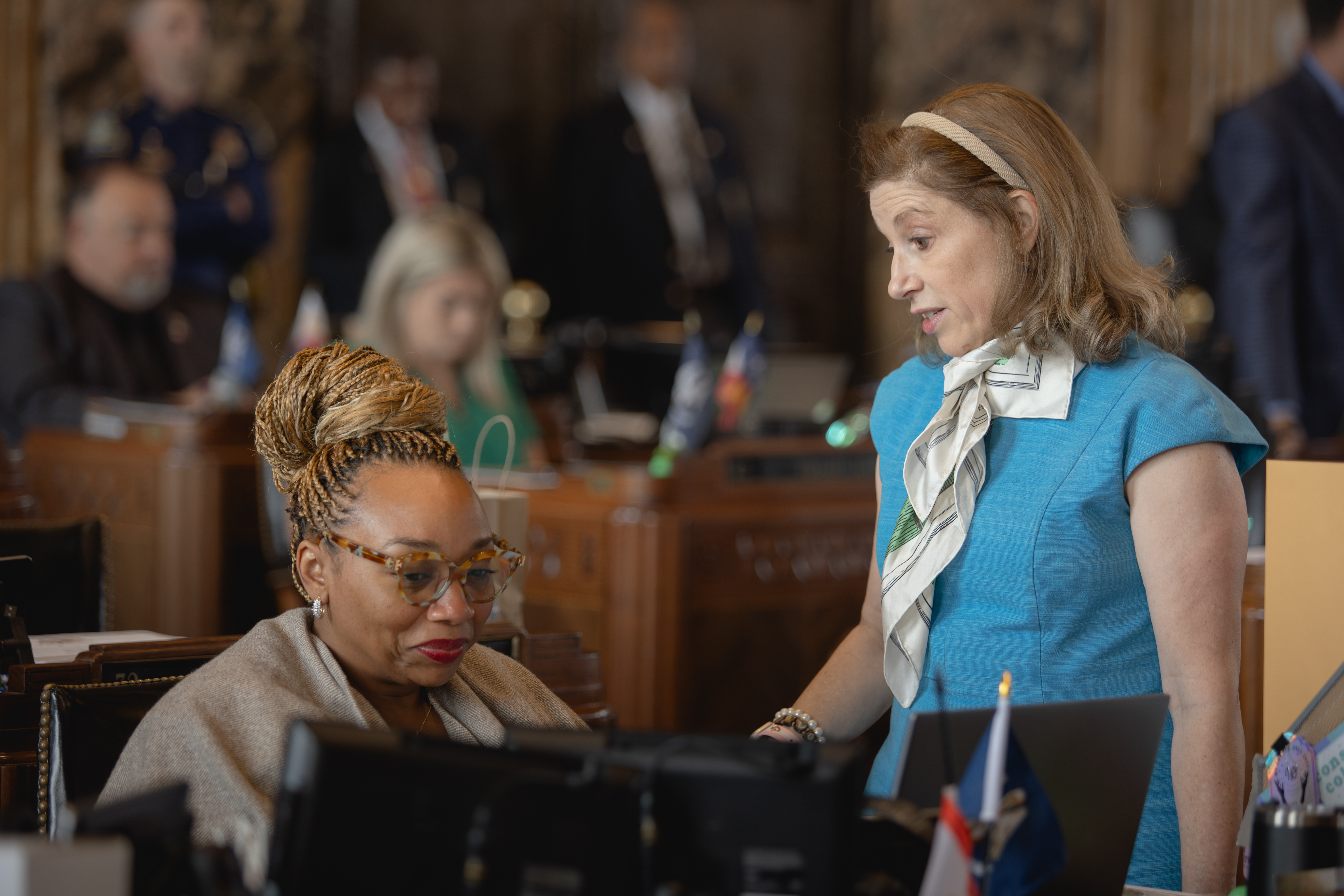 Candace N. Newell meeting with a community member